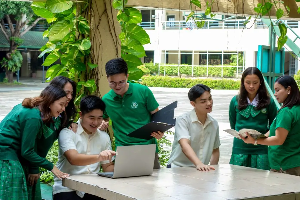student discussion under trellis